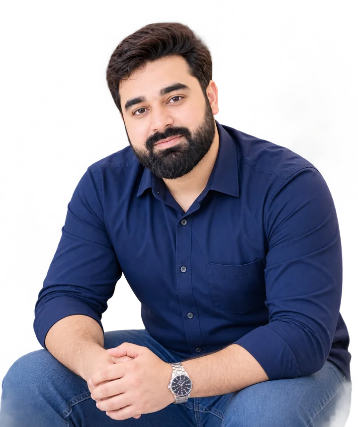 Rizwan Aslam smiling, in a navy shirt